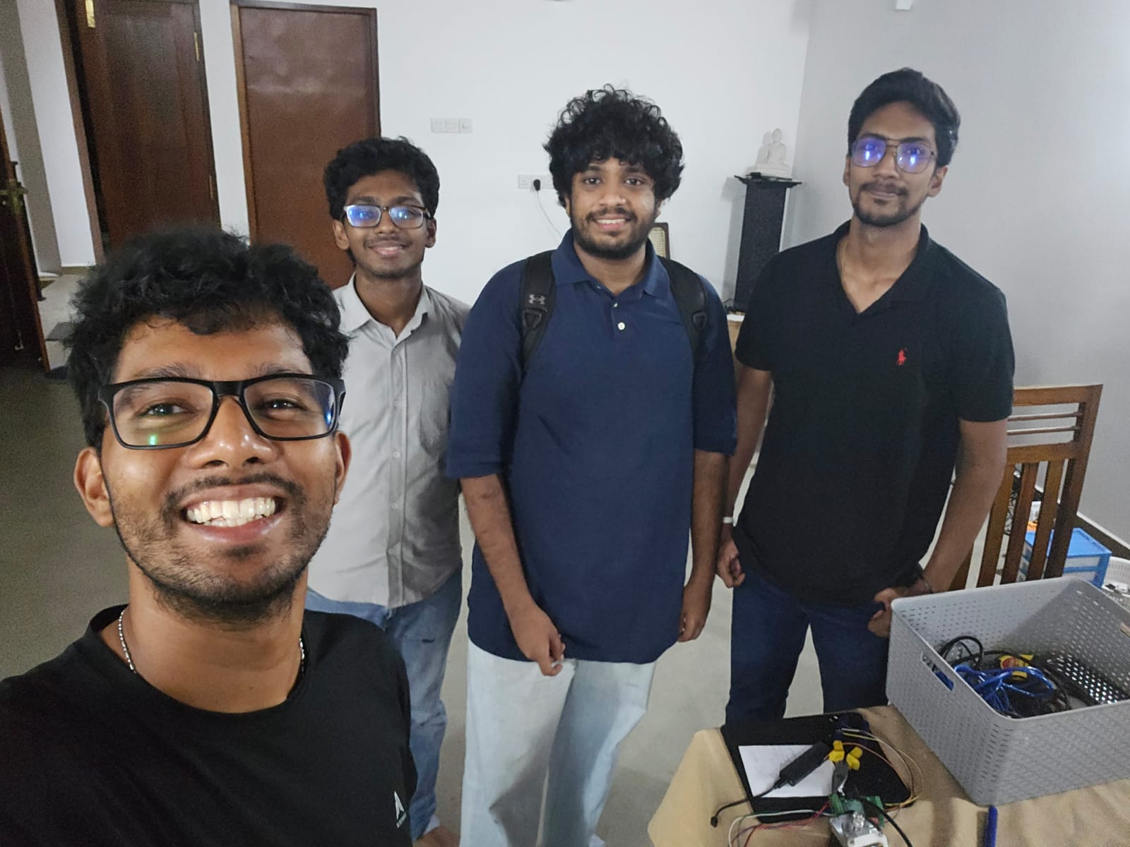 Futuora engineering team with prototype electronics